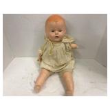 Vintage composition, baby doll with sleeping eyes