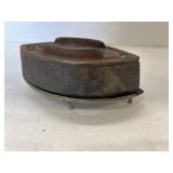 Antique Sad Iron on rest