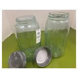 2 - one quart canning jars. 1-Atlas and one