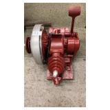 Red Maytag motor on wood block. 3ï¿½1934