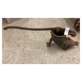 Antique cast iron sausage stuffer.