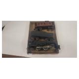 Lionel train, tender,  and caboose