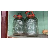 2 one gallon milk containers unmarked, with