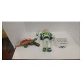 Buzz lightyear, remote controlled dinosaur, and