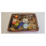 Miscellaneous box of can openers, combs, and tins