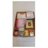 Lot of lighters, not zippos, and purses