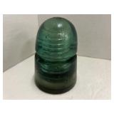 Vintage green glass insulator