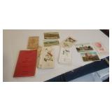 Vintage postcards, manual, and sign