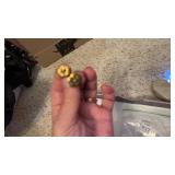 Gold(?) flower earrings