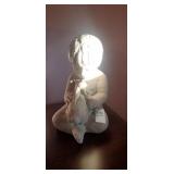 Boy and bunny statue