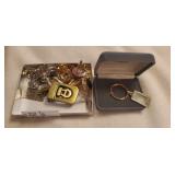 Assorted cufflinks , and keychain