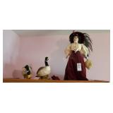 2 geese and doll