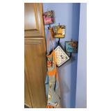 Three hanging wall displays with one apron and 4