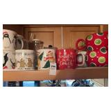 Cabinet lot of coffee, mugs, and miscellaneous