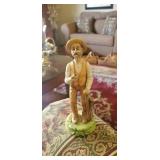 Old man with pipe, and old lady with carrots