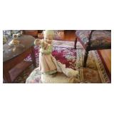 Little girl with geese, and little boy with