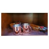 2 Moscow mule mugs, and wooden serving dishes