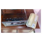 Emerson clock radio and telephone.