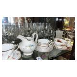 Shelf of Assorted China and Glasses