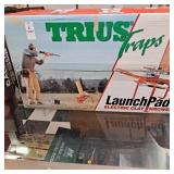 Electric clay thrower launch pad trust traps