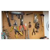Snips, Wrenches, Items on Pegboard with Clock