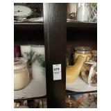 Shelf lot of candles