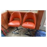 2 Orange Vintage Swivel Chairs