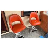 2 Orange Vintage Swivel Chairs