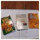 Three hard back books,