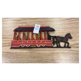 Cast iron horse-drawn trolley wall hanger