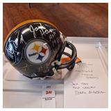 Autographed Pittsburgh Steelers on mini helmet,