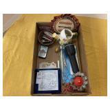 Thermometer, scissors, flashlight, candle