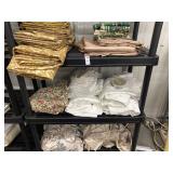 Three shelves of curtains