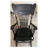 Antique press back rocking chair