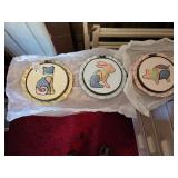 3 ceramic wall hangings