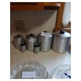 Vintage aluminum canisters with salt and pepper