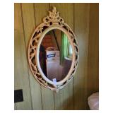 Oval wall mirror 28in x 16in.