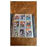 Binder of 1984 Football Cards