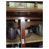 Shelf lot of kitchen items, baking pans, colander