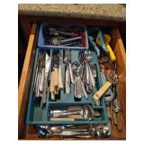 Drawer lot of silverware and kitchen utensils
