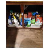 Under sink lot of household cleaners etc.