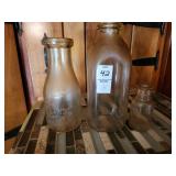 Assortment of milk bottles