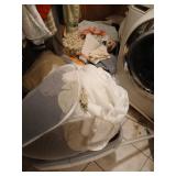 Floor lot of towels, laundry baskets etc
