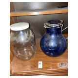 2  lidded glass jars