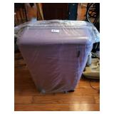 American Tourist suit case
