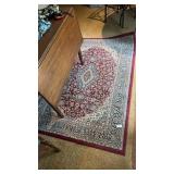 Maroon area rug 68inch by 48inch