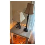 2 metal table lamps and bedside table