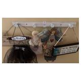 Lot of hanging decor and signs
