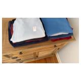 Lot of crew necks and sweaters