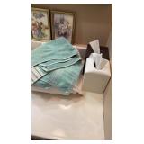 Contents of bathroom (towels, pictures, and more)